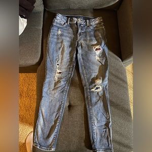 Maurice’s jeans with tears and patches